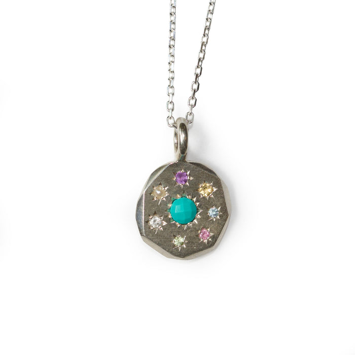 Sterling silver Stargazer round pendant set with 8 stones