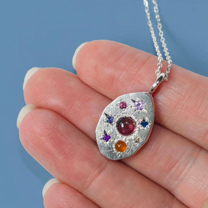 Sterling silver large Stargazer oval pendant set with 8 stones