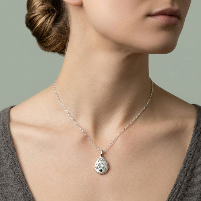 Sterling silver Stargazer pebble pendant set with 5 stones