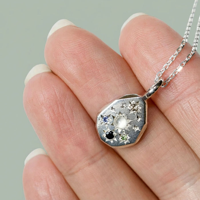 Sterling silver Stargazer pebble pendant set with 5 stones