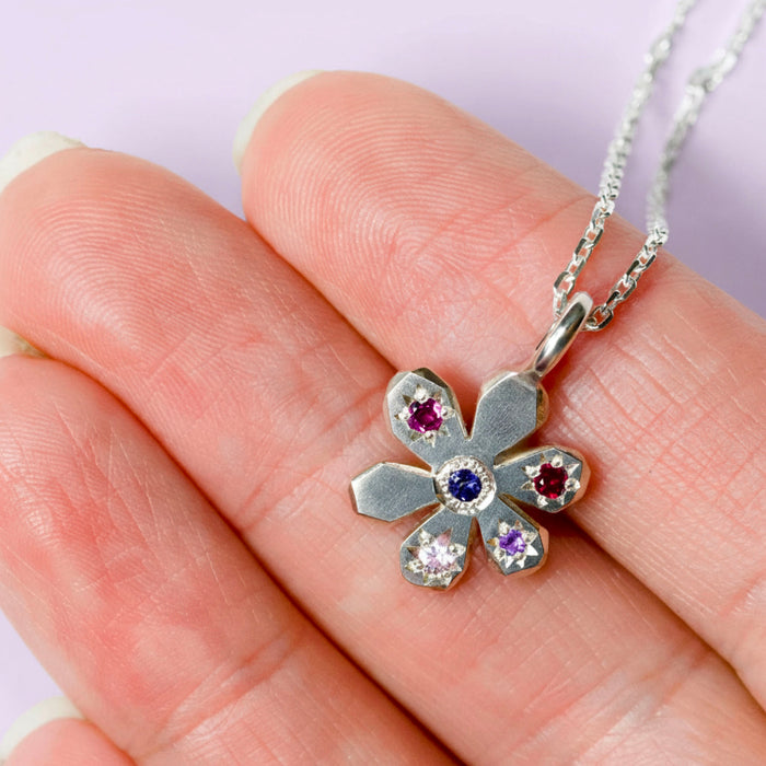 Sterling silver small flower Stargazer pendant